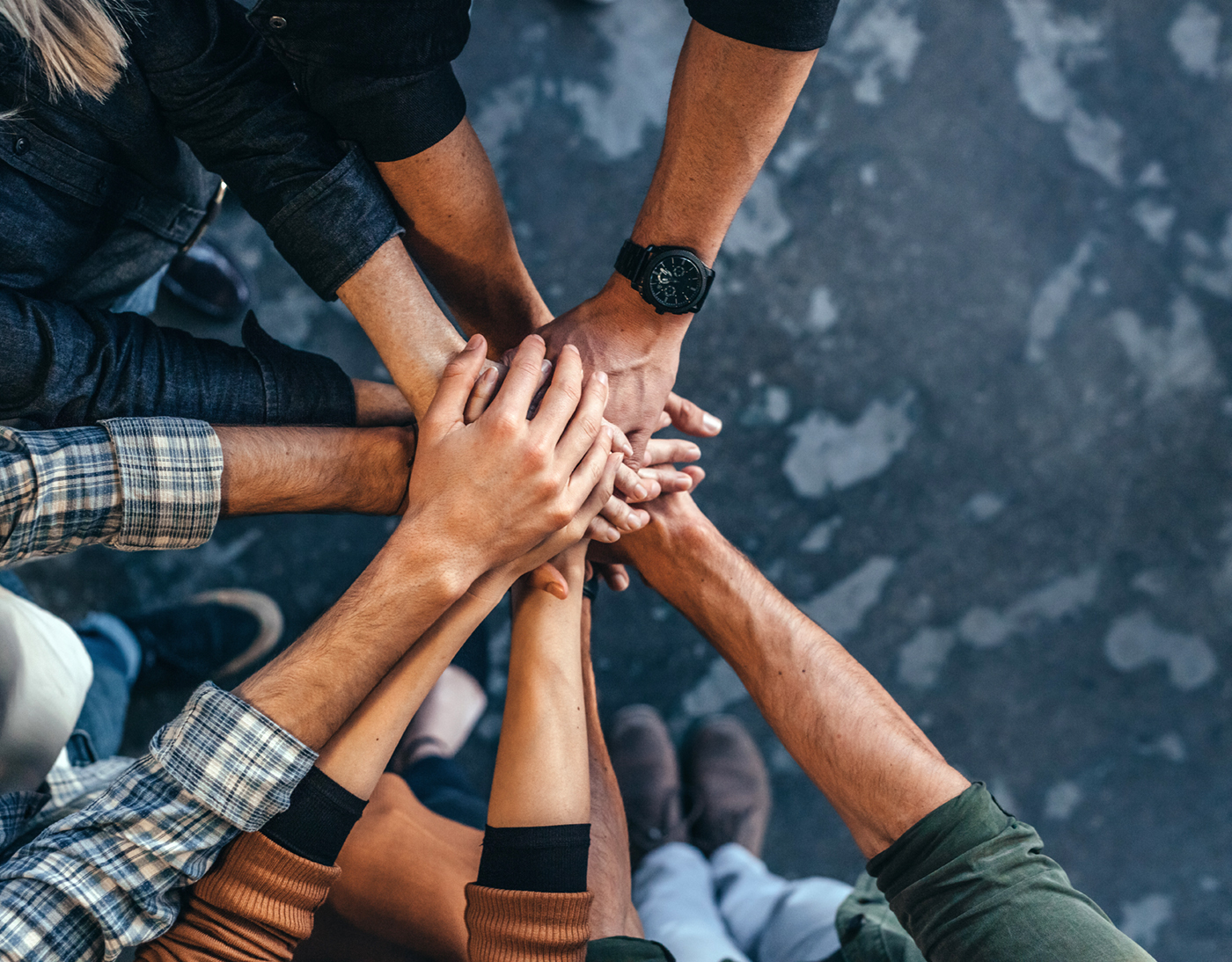 group of people holding hands